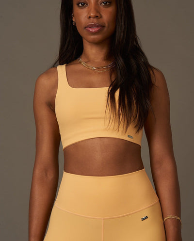 Bel Air Bra en Peach-Bras-Tienda Ropa Leggings Yoga Sostenibles Reciclados Mujer On-line Barcelona Believe Athletics Sustainable Recycled Yoga Clothes