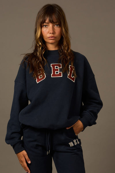 COMING SOON Varsity Hoodie Navy-Sweatshirts-Shop Sustainable Recycled Yoga Leggings Women's Clothing On-line Barcelona Believe Athletics Sustainable Recycled Yoga Clothes