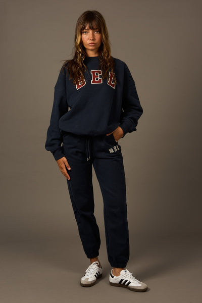 COMING SOON Varsity Hoodie Navy-Sweatshirts-Shop Sustainable Recycled Yoga Leggings Women's Clothing On-line Barcelona Believe Athletics Sustainable Recycled Yoga Clothes