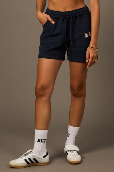 Varsity Shorts Navy-Shorts-Tienda Ropa Leggings Yoga Sostenibles Reciclados Mujer On-line Barcelona Believe Athletics Sustainable Recycled Yoga Clothes