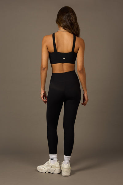 Crossed Daily Legging in Black-Long Leggings-Tienda Ropa Leggings Yoga Sostenibles Reciclados Mujer On-line Barcelona Believe Athletics Sustainable Recycled Yoga Clothes