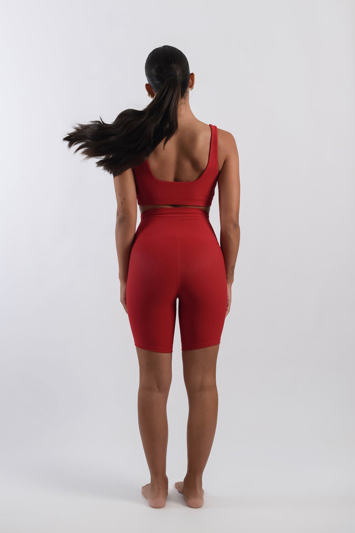 West Biker in Red-Bikers-Tienda Ropa Leggings Yoga Sostenibles Reciclados Mujer On-line Barcelona Believe Athletics Sustainable Recycled Yoga Clothes